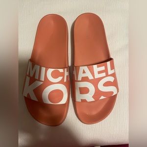 Michael Kors slides.